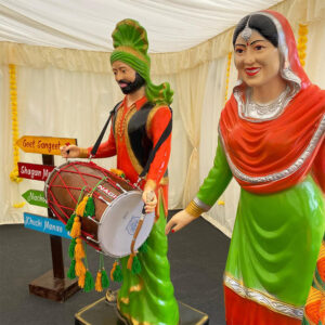 Punjabi Dholi And Dancing Lady Fiber Statue Set 1 Image